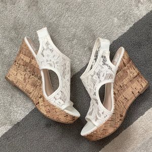 Women’s size 7 white lace wedge cork sandals.